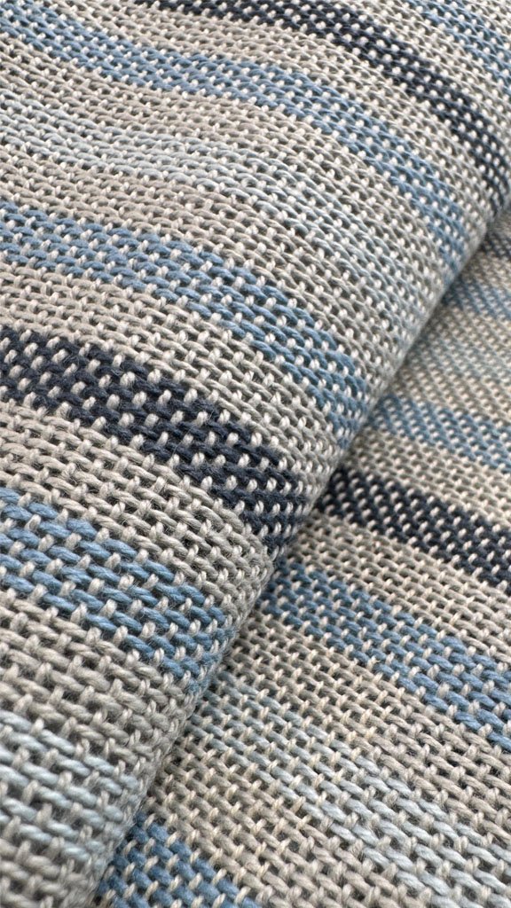 close up of grey and blue towel