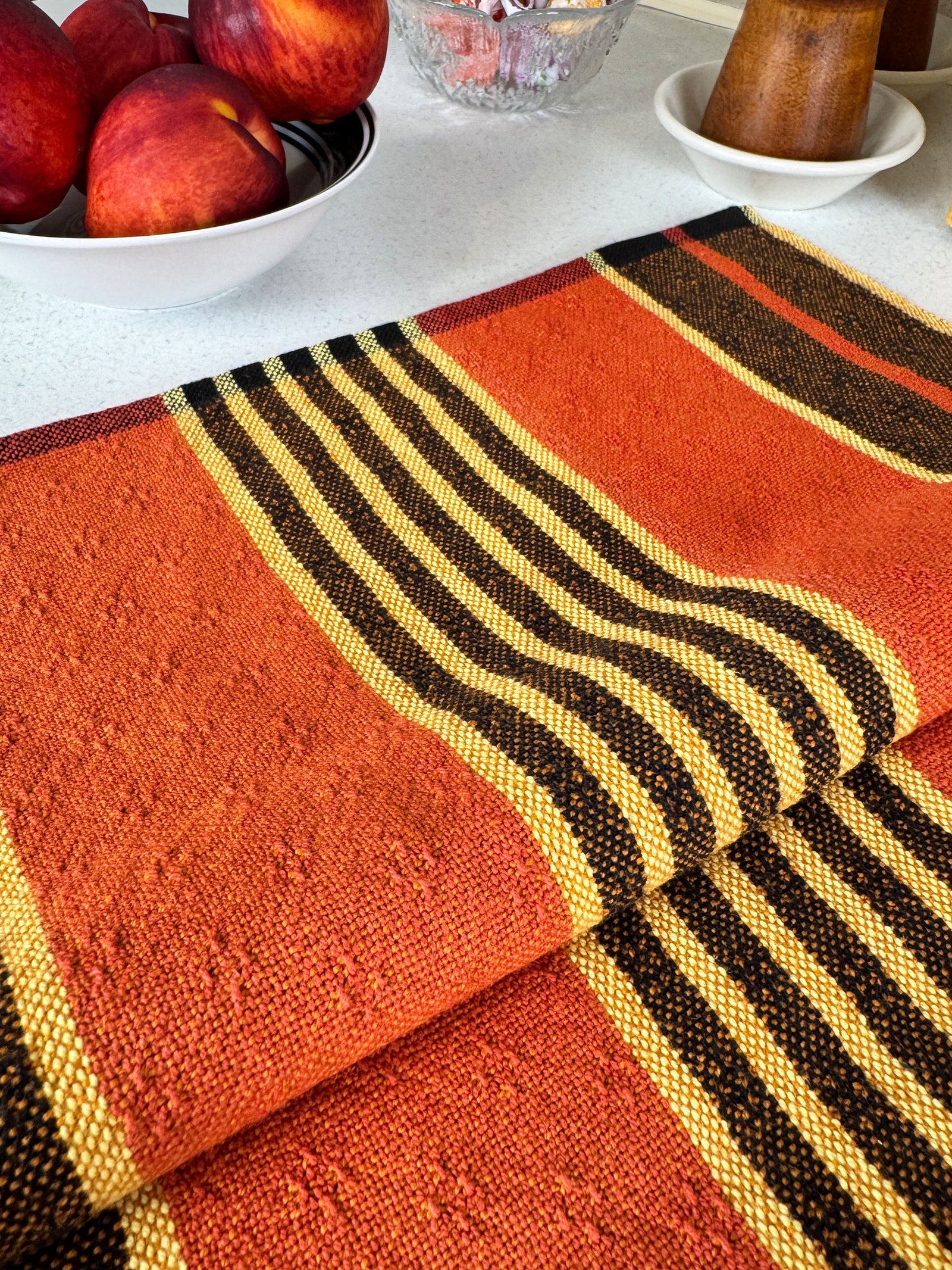 folded halloween striped tea towels