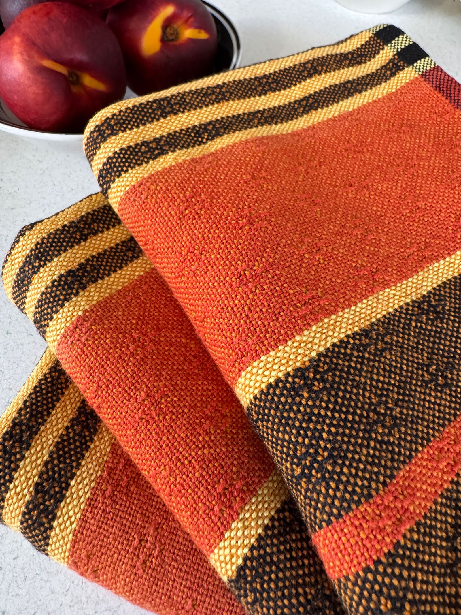 folded halloween striped tea towels